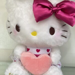 PELUCHE HELLO KITTY CON MOÑO FUCSIA 23CM