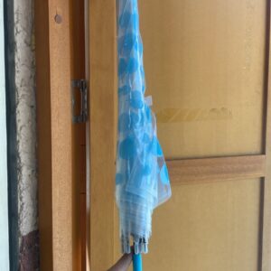 SOMBRILLA TRANSPARENTE CON CIRCULOS CELESTE